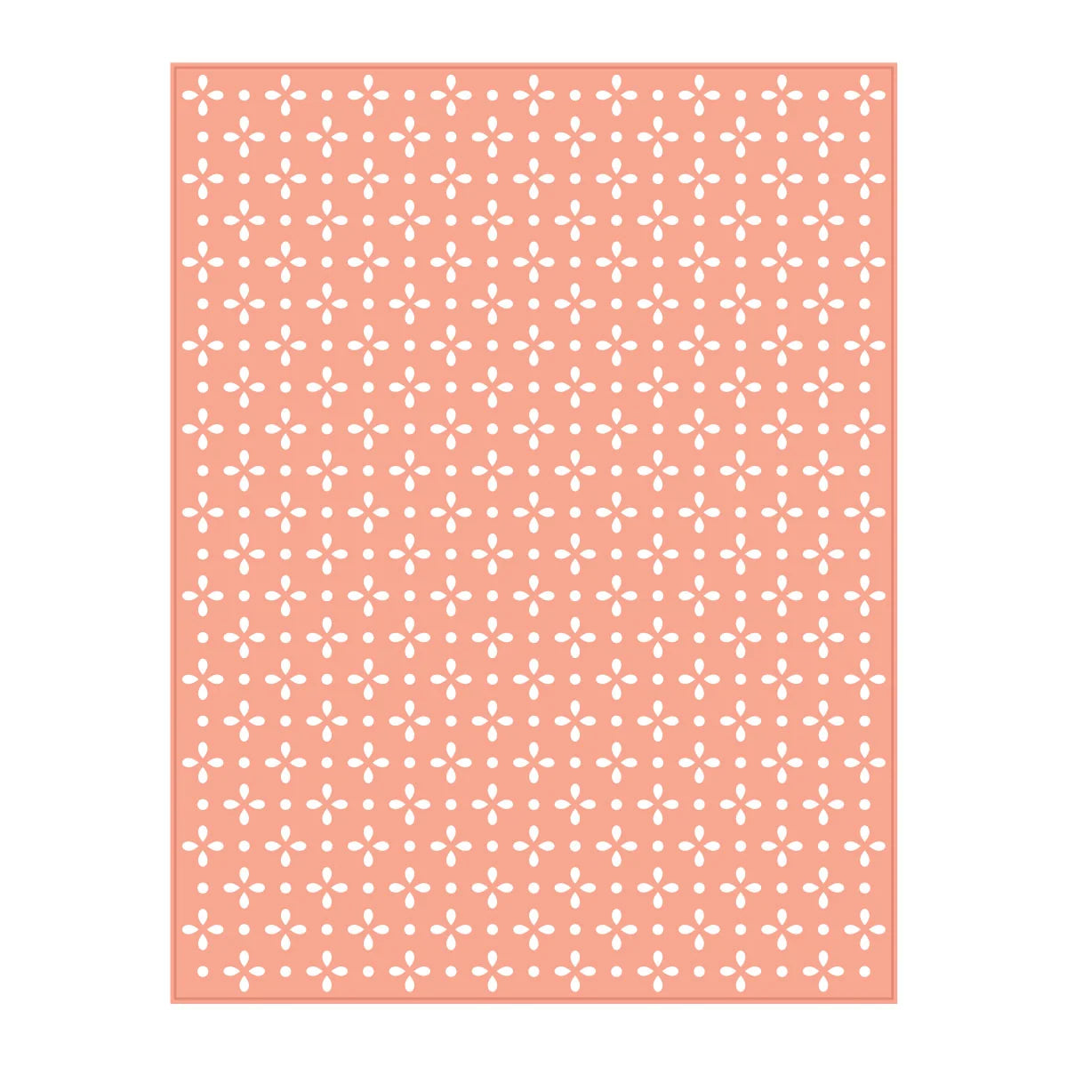 A rectangular die cut template with a repeating quilted white geometric pattern on a soft coral pink background, shown against a plain white backdrop.