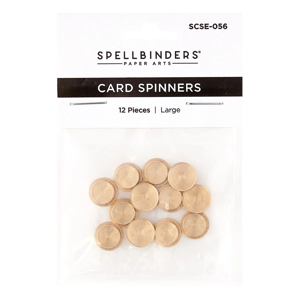 Spellbinders Paper Arts Card Spinners in a clear plastic bag with a white header card. The package contains 12 large gold-colored circular card spinners, and the header card displays the product code SCSE-056 and the Spellbinders brand name.