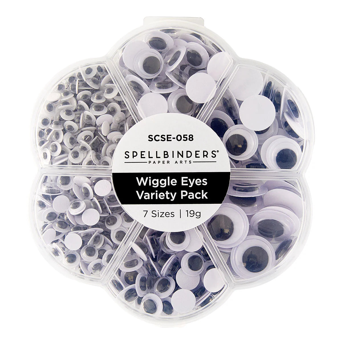Spellbinders Paper Arts Wiggle Eyes Variety Pack in a clear plastic clamshell container with seven compartments, showing a mix of white, black, and gray googly eyes in different sizes.