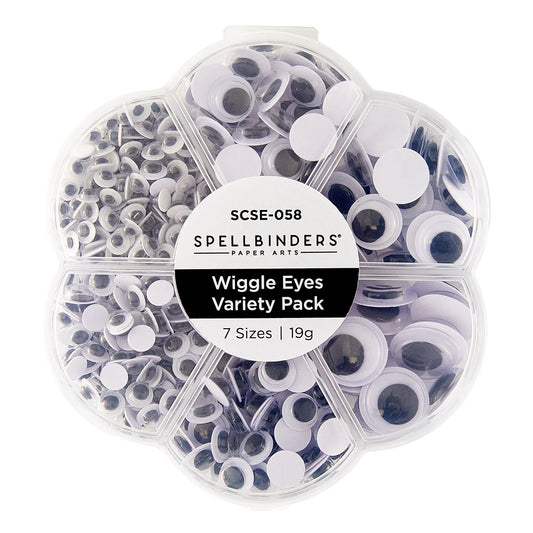 Spellbinders Paper Arts Wiggle Eyes Variety Pack in a clear plastic clamshell container with seven compartments, showing a mix of white, black, and gray googly eyes in different sizes.