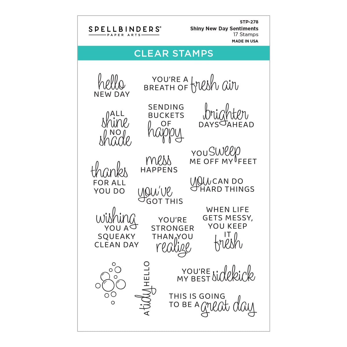 Set of clear stamps with various motivational phrases on a white background, branded 'Spellbinders'.