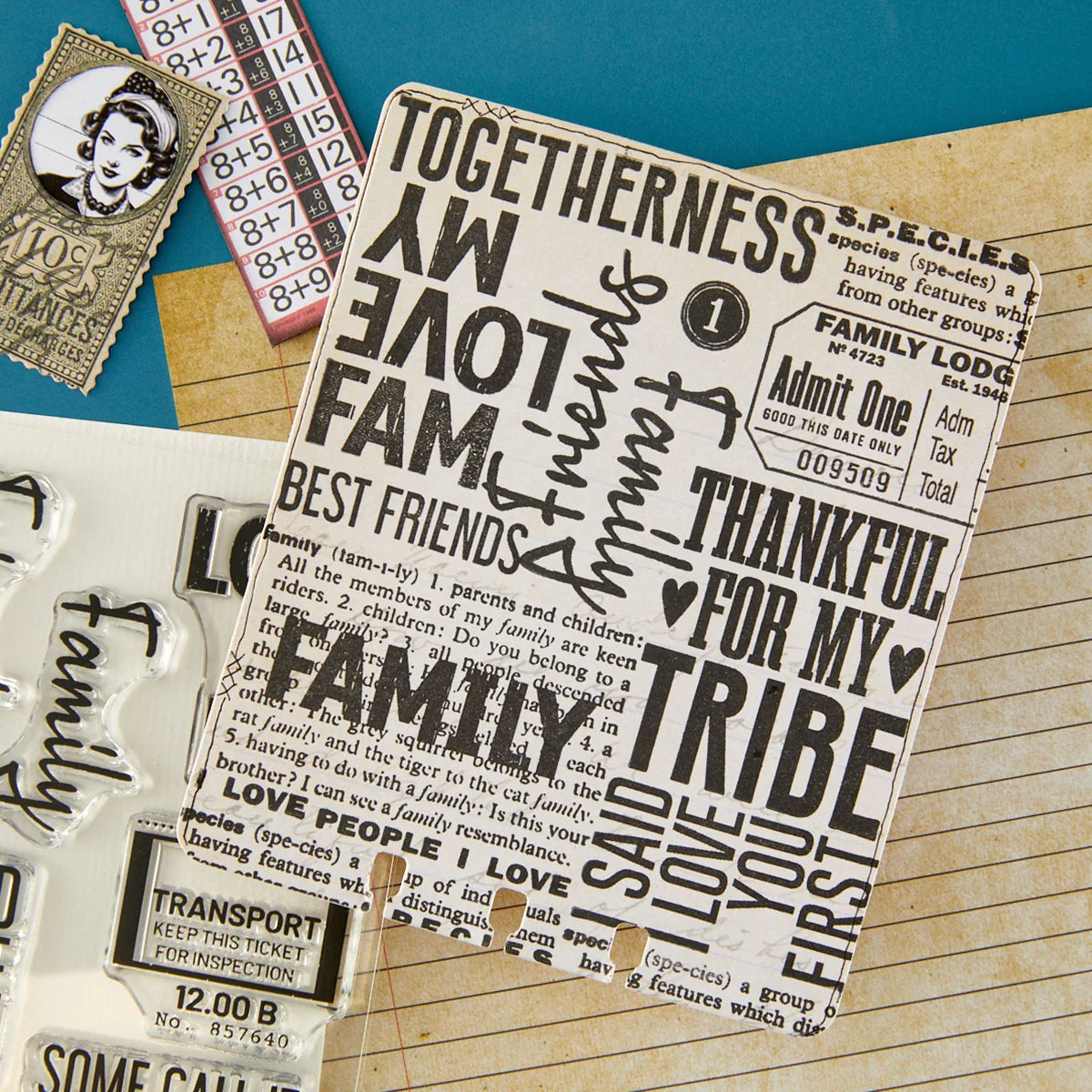 Esther Glas decorative paper with text and vintage-style stamps on a textured surface