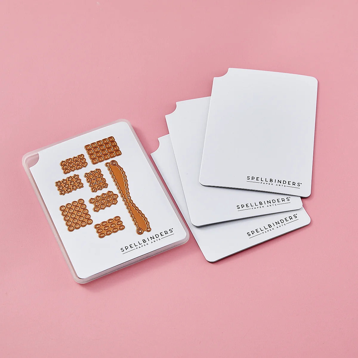 Set of Spellbinders magnetic sheets folders on a pink background