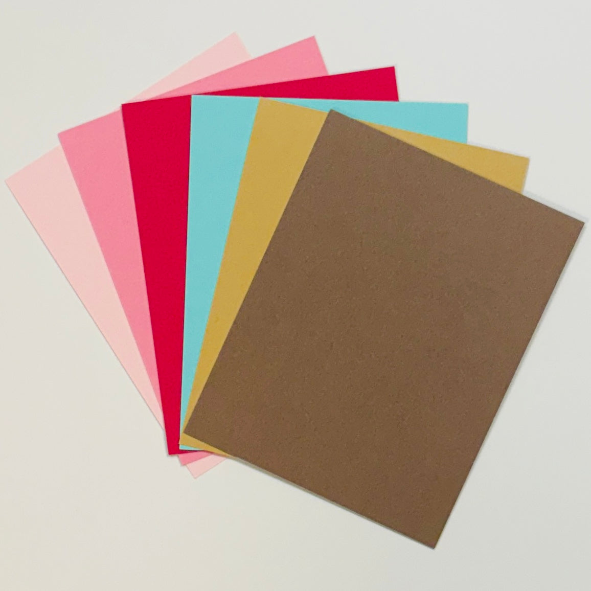 Spellbinders ColorWheel Cardstock Baker A2 Palette sample pack fanned out colors