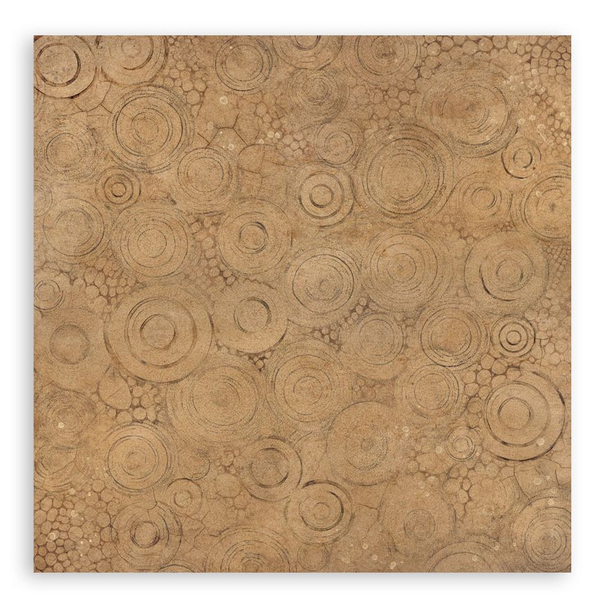 Textured brown paper with circular patterns on a white background