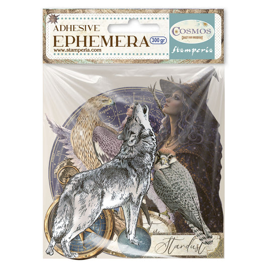 A package of 'Adhesive Ephemera' stickers by Stamperia, featuring celestial and mystical designs including a wolf, owl, eagle, compass, and a woman in profile. The packaging has a clear plastic sleeve and a decorative header card.