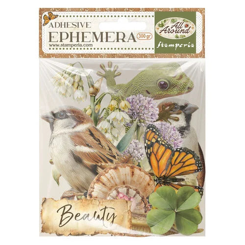 butterfly, four leaf clover, beauty, bird, and flower die cut pieces in stamperia packaging on a white background