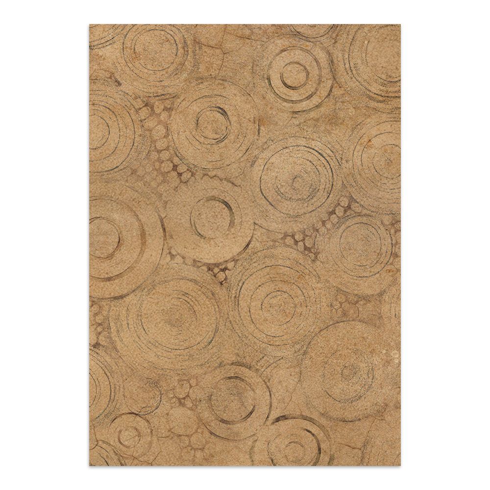 Textured brown paper with circular patterns on a white background