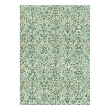 Patterned green rug on a white background