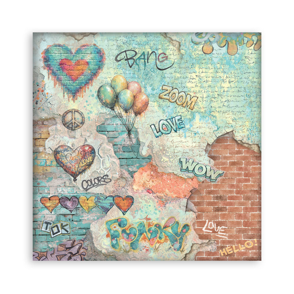 A square paper featuring a colorful graffiti-style collage with hearts, balloons, handwritten words like 'Bang', 'ZOOM', 'LOVE', and 'WOW', a peace sign, and a brick pattern on a distressed light blue background.