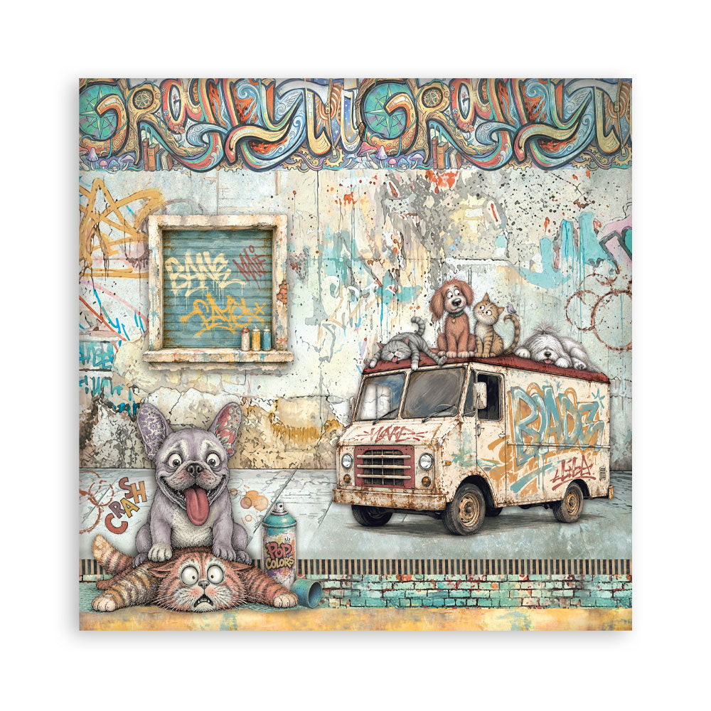 A square sheet of paper featuring a colorful graffiti-style street scene with cartoon animals. A gray cat sits on a striped floor mat in the lower left, a white van with graffiti is parked on the right, and several dogs and cats are visible on and around the van.