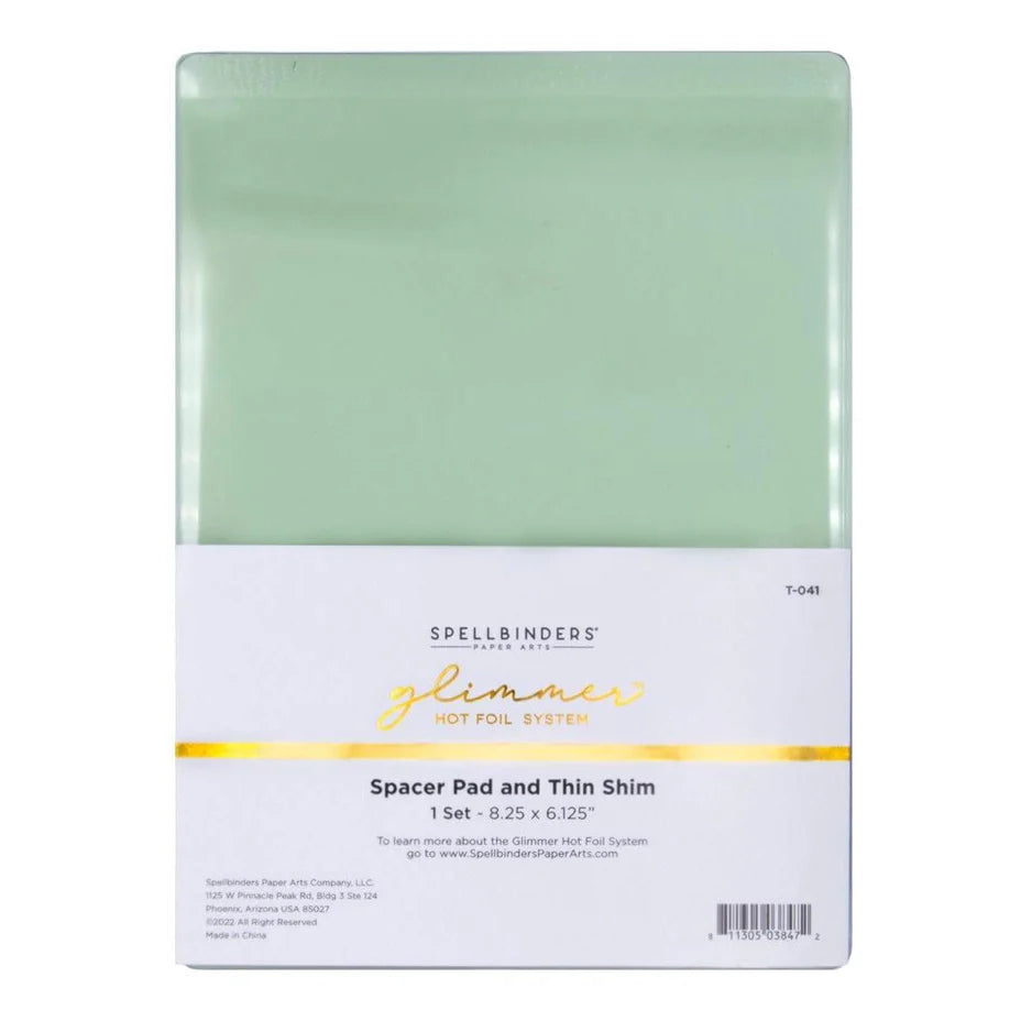 Packaging of Spellbinders spacer pad and thin shim on a white background