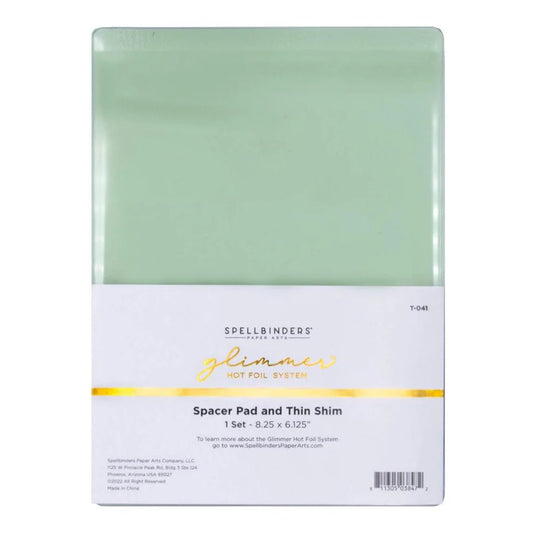Packaging of Spellbinders spacer pad and thin shim on a white background