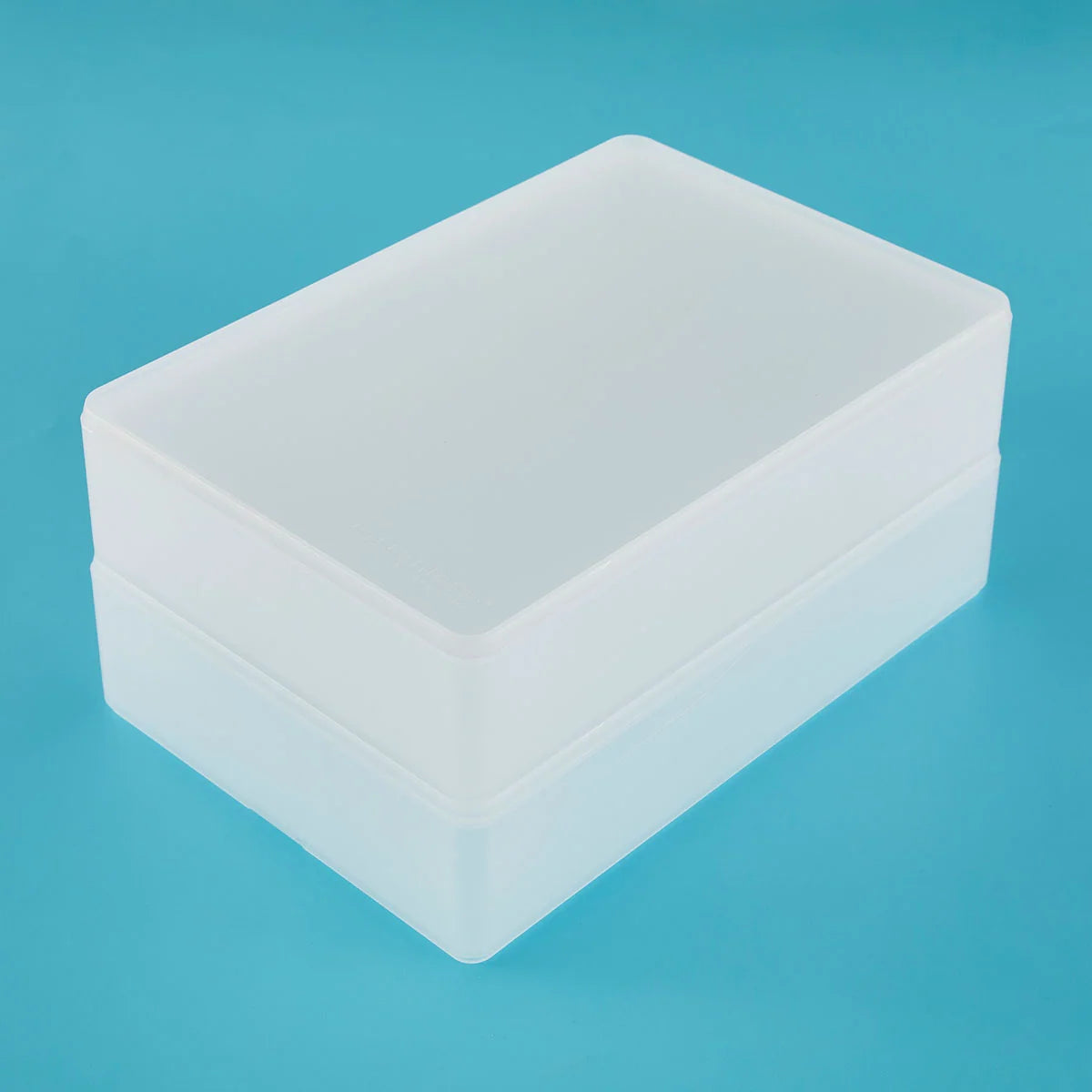 A translucent white plastic storage box with a lid, shown at an angle on a solid blue background.
