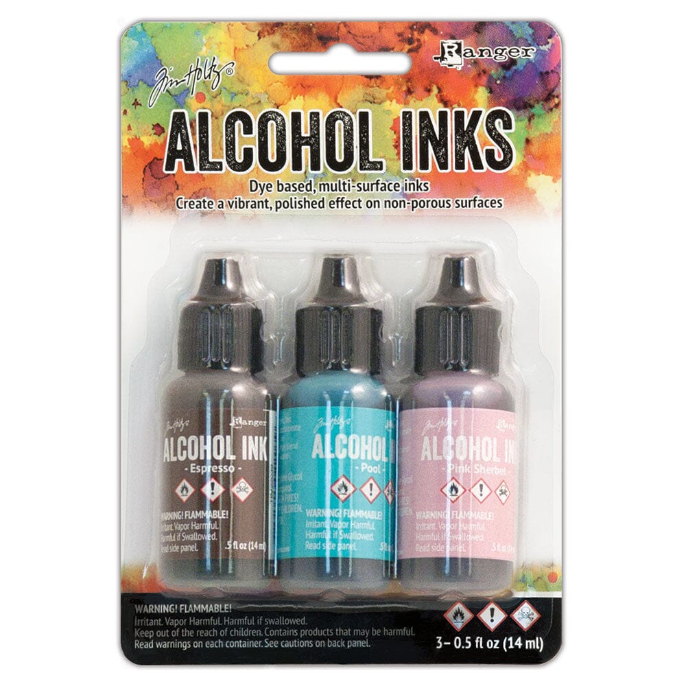 Ranger Tim Holtz Alcohol Ink 3-pack in Expresso brown, turquoise blue, and lavender pink, in a blister card package.