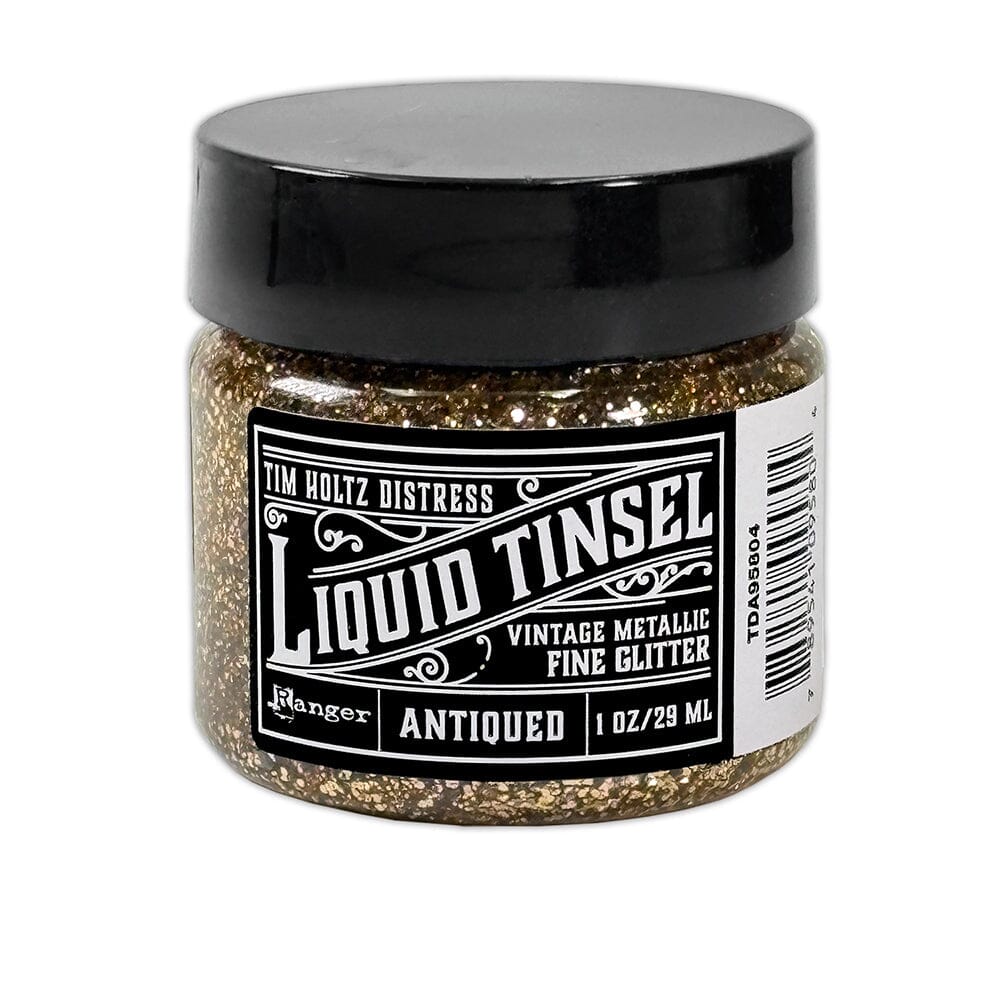 A jar of Ranger Tim Holtz Distress Liquid Tinsel Antiqued Vintage Metallic Fine Glitter, 1 oz / 29 ml, featuring a black lid and a black-and-white label, set against a plain white background.