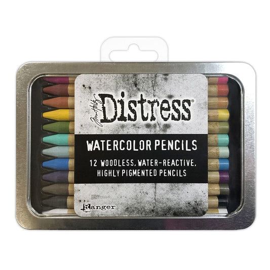 Pack of Distress watercolor pencils in a tin with a visible brand label.