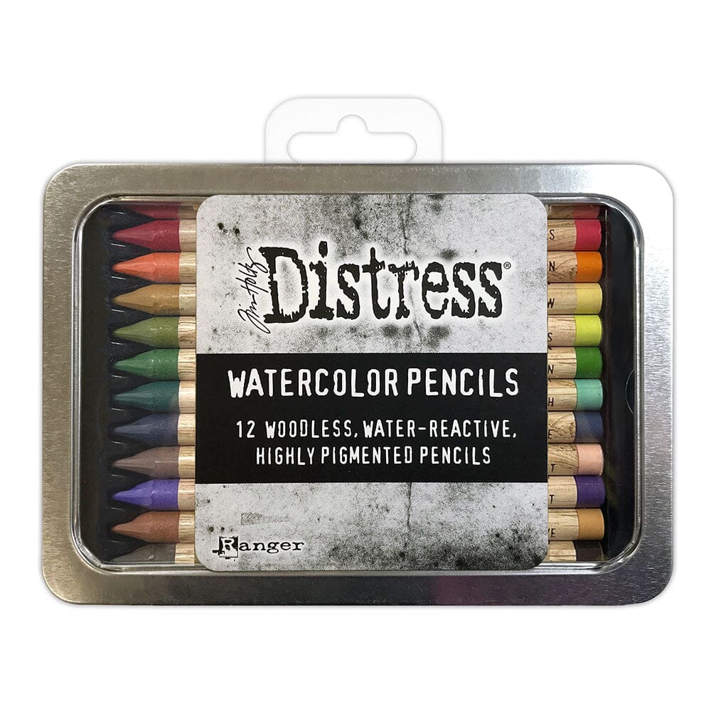 Set of Distress watercolor pencils in a tin packaging on a white background