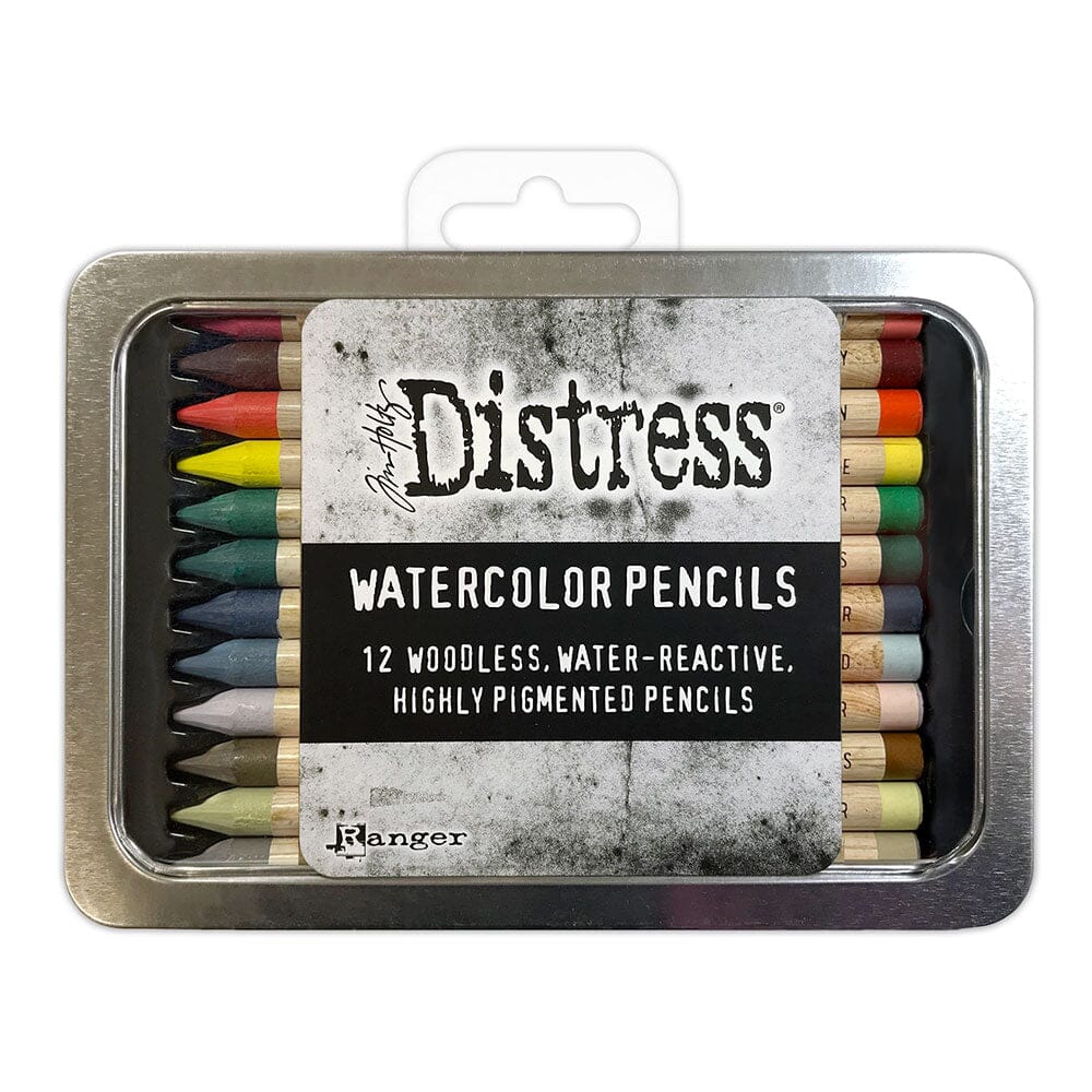 Set of Distress watercolor pencils in a tin packaging on a white background