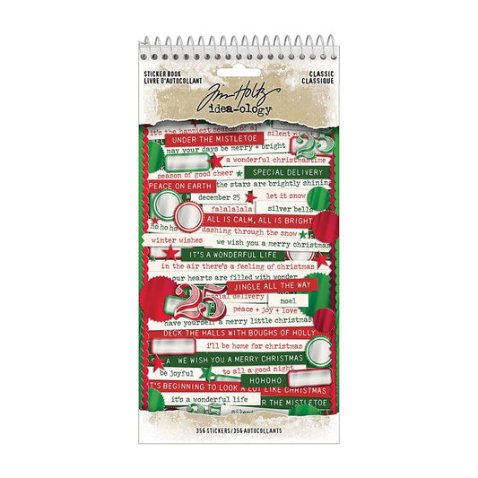 A spiral-bound christmas sticker book by Tim Holtz, featuring festive red, green, and white holiday stickers with Christmas quotes and illustrations on a white background.