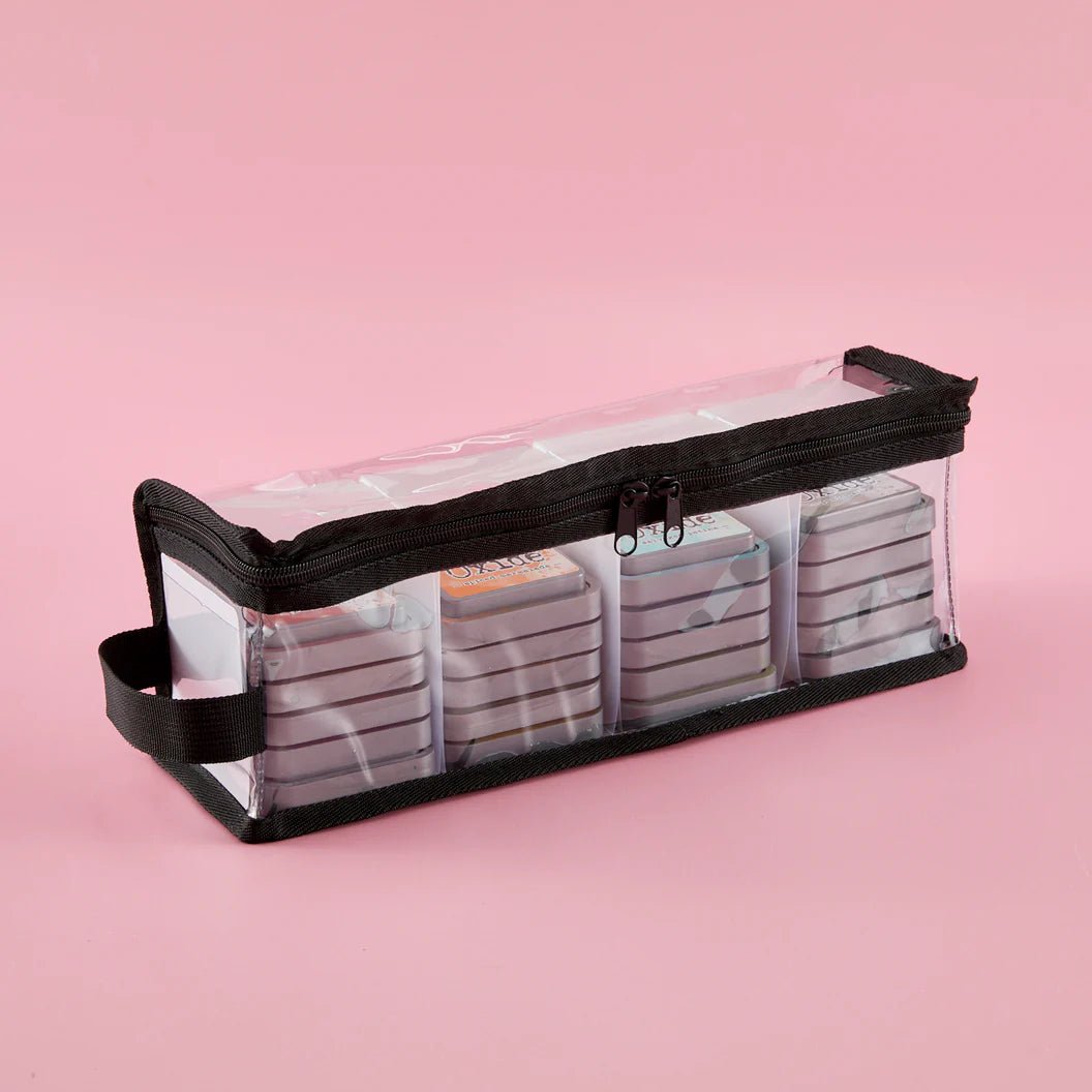 Ink pad clear organizer with black zipper on a pink background