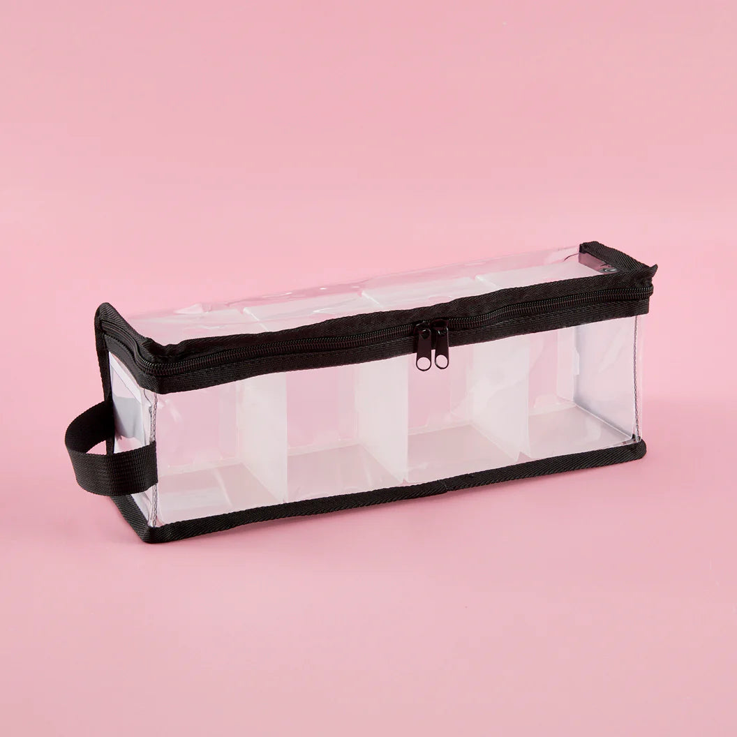 Ink pad organization bag with black zipper on a pink background