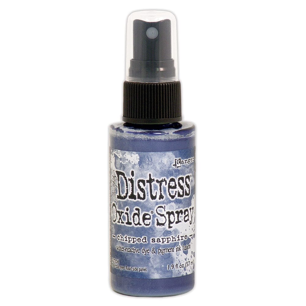 Distress Oxide Spray bottle with blue label on a white background
