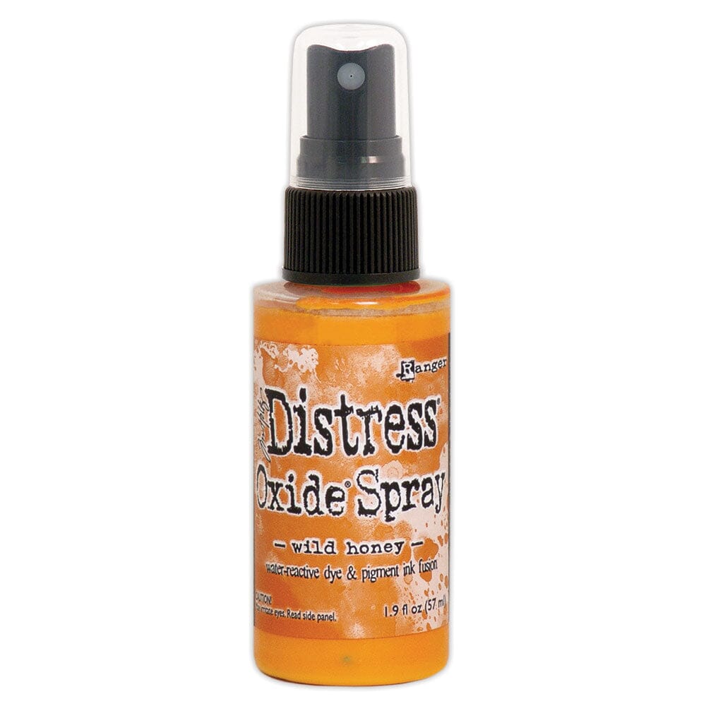 Distress Oxide Spray bottle labeled 'Wild Honey' on a white background