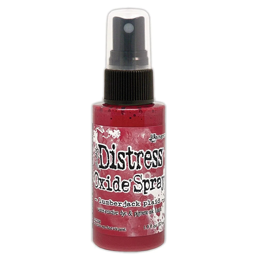 Bottle of Tim Holtz Distress Oxide Spray on a white background
