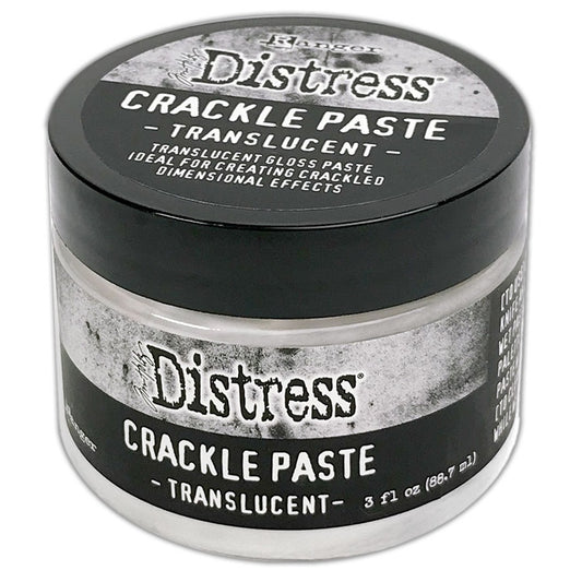 A container of Tim Holtz Distress Crackle Paste Translucent, which is a clear-colored craft paste used for creating crackled effects on paper.