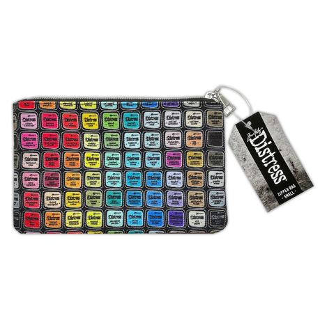 Tim Holtz zipper Pouch with colorful stamp pattern and 'Distress' tag on a white background