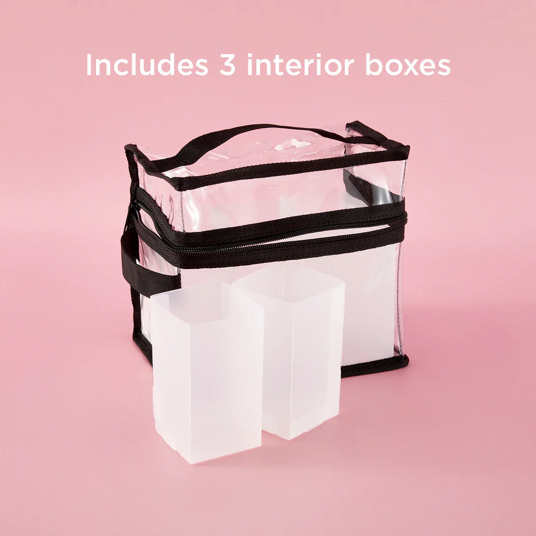 Clear craft storage bag with black straps on a pink background, labeled 'Includes 3 interior boxes'.