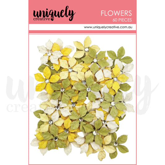 glitter yellow and green five petal flowers with rhinestone centers in uniquely creative packaging