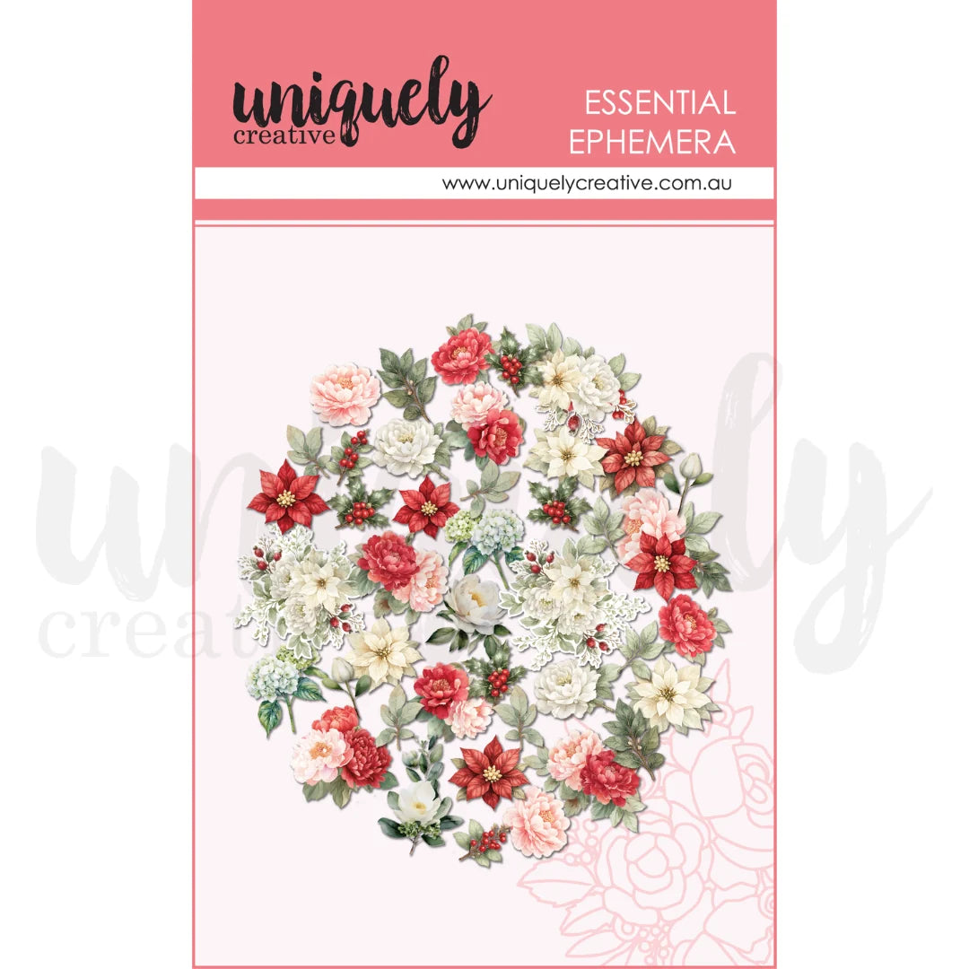 Uniquely Creative essential ephemera of laser cut Pink, red, and white paper florals in packaging on white background 
