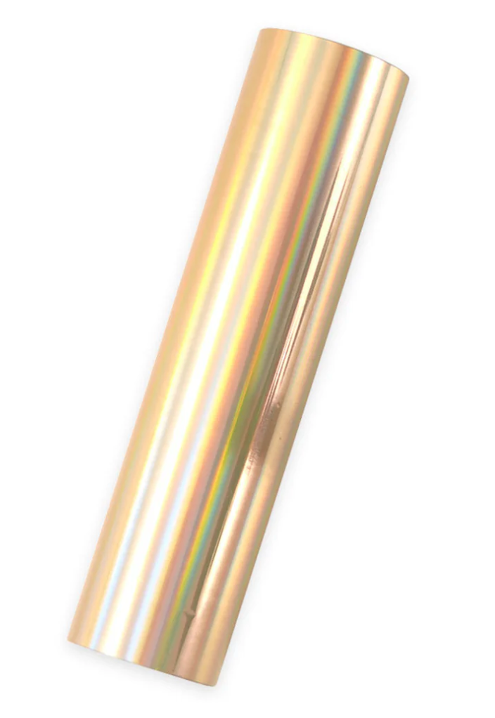 A single roll of aura holographic glimmer hot foil with a metallic finish.