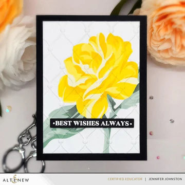 Framed artwork with a yellow flower and 'Best Wishes Always' text on a decorative background.